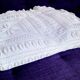 Knitted white cotton bedspread