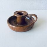 Signed sandstone candle holder