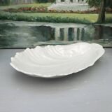 Scallop-shaped pocket emptier