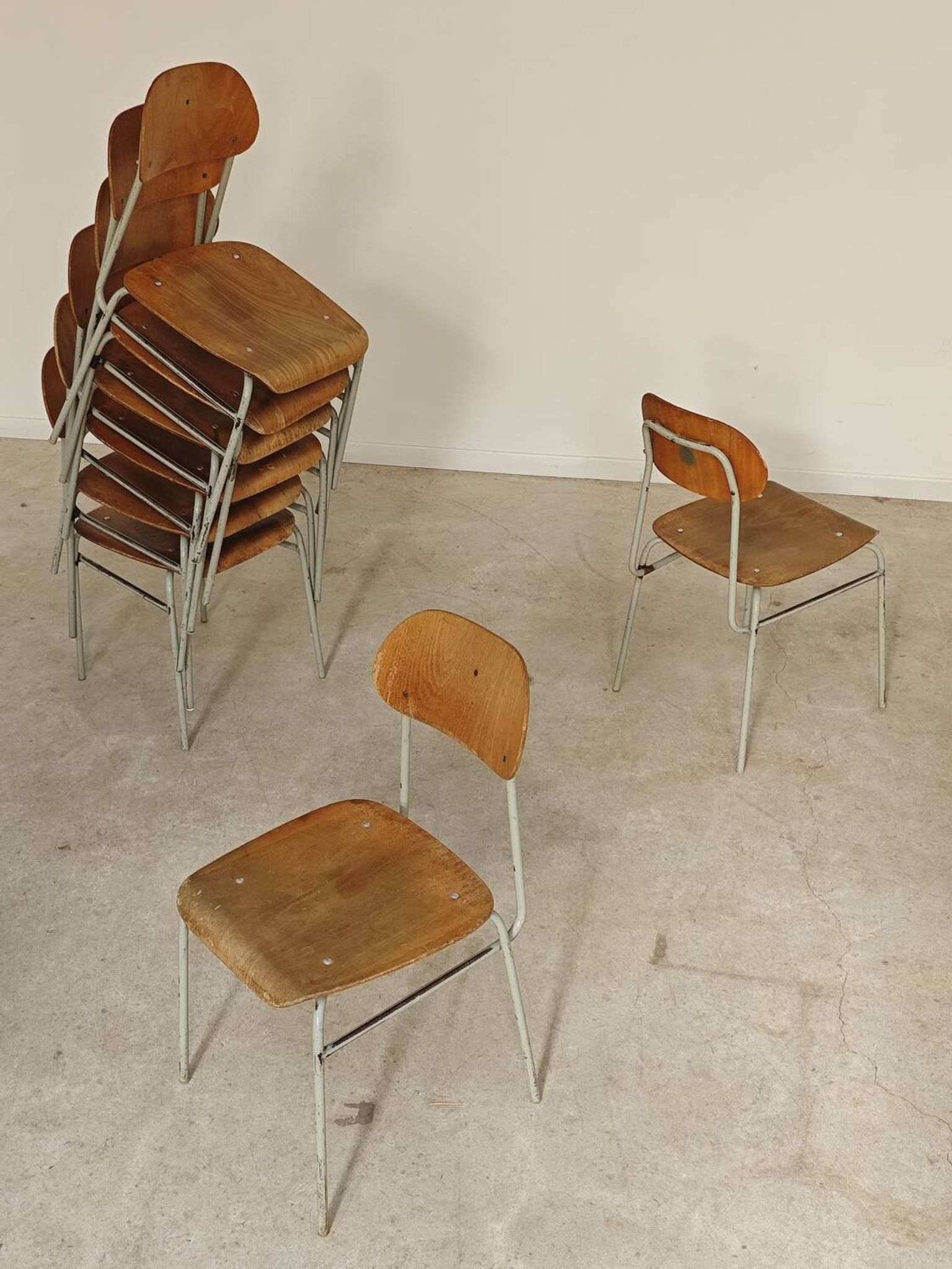 Set of 8 metal and wood school chairs  
Ex Czechoslovakia 1960