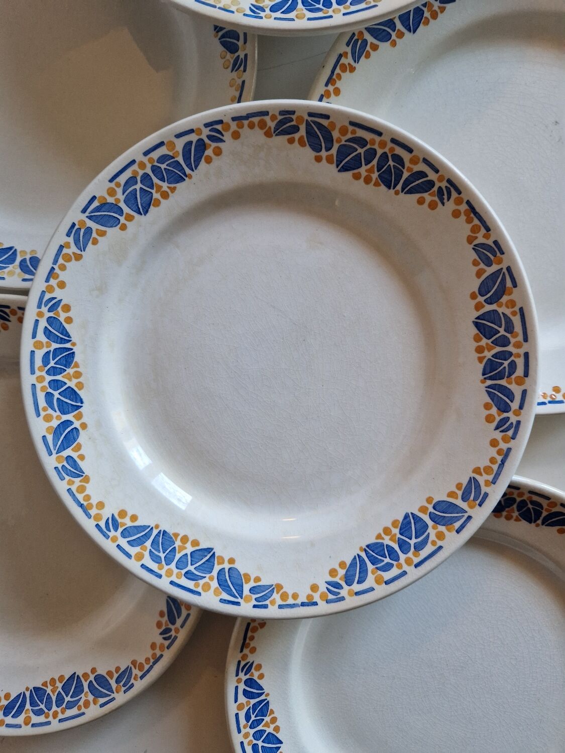 Set of 12 antique Art Deco plates, earthenware from Creil Montereau.