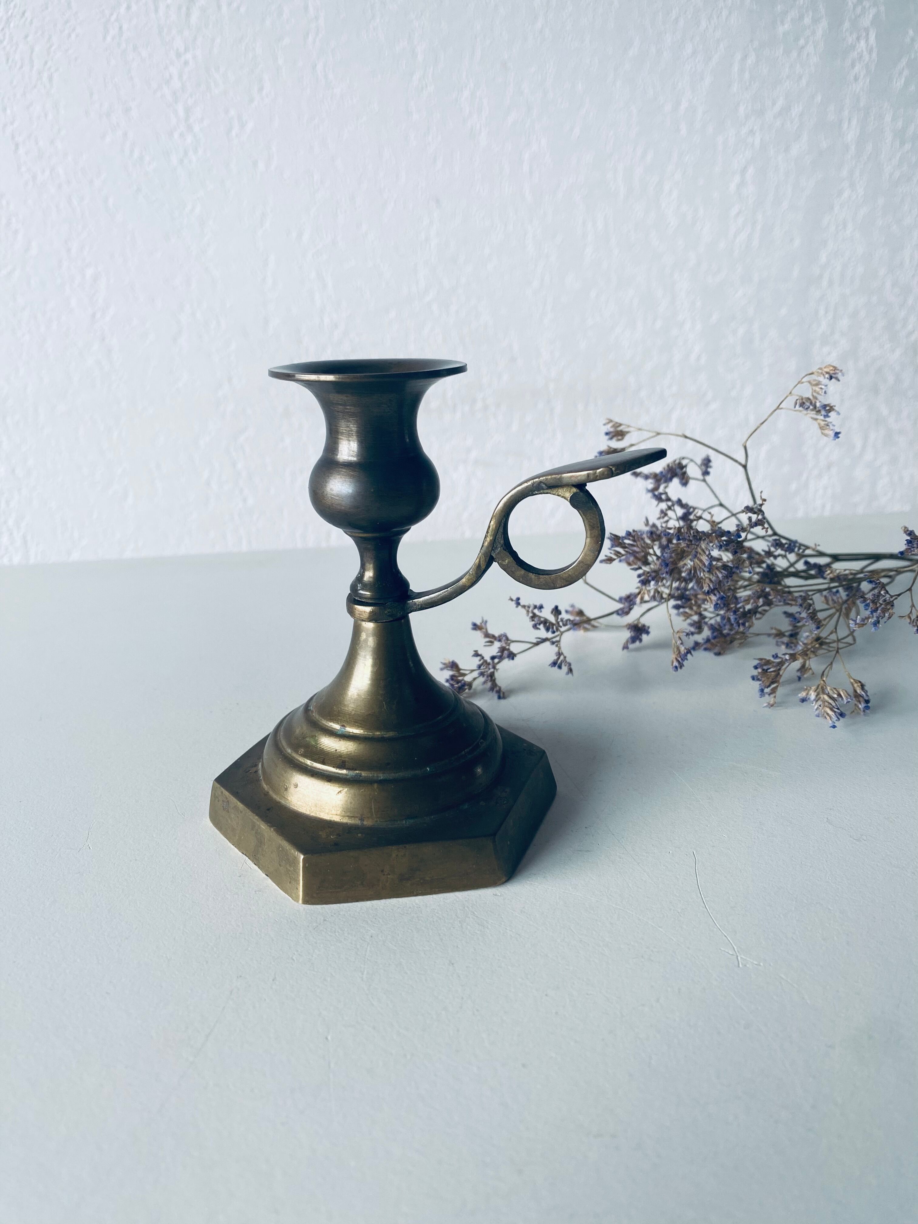 Candle holder with bronze handle