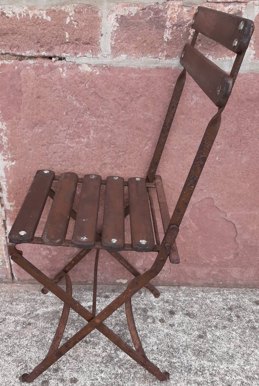 Foldable wrought iron chair