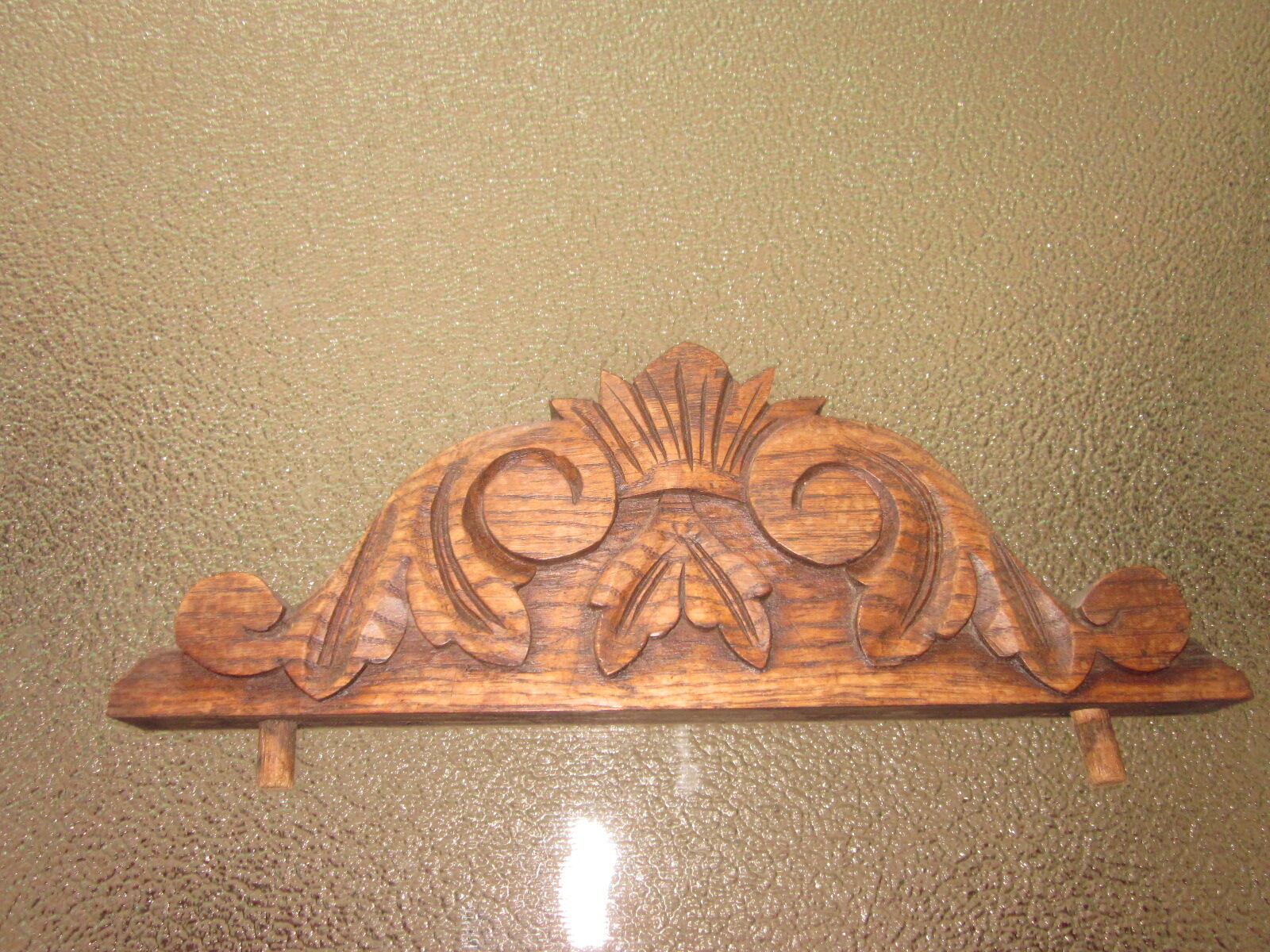 old pediment in oak