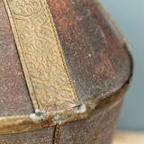 Old terracotta and brass bottle