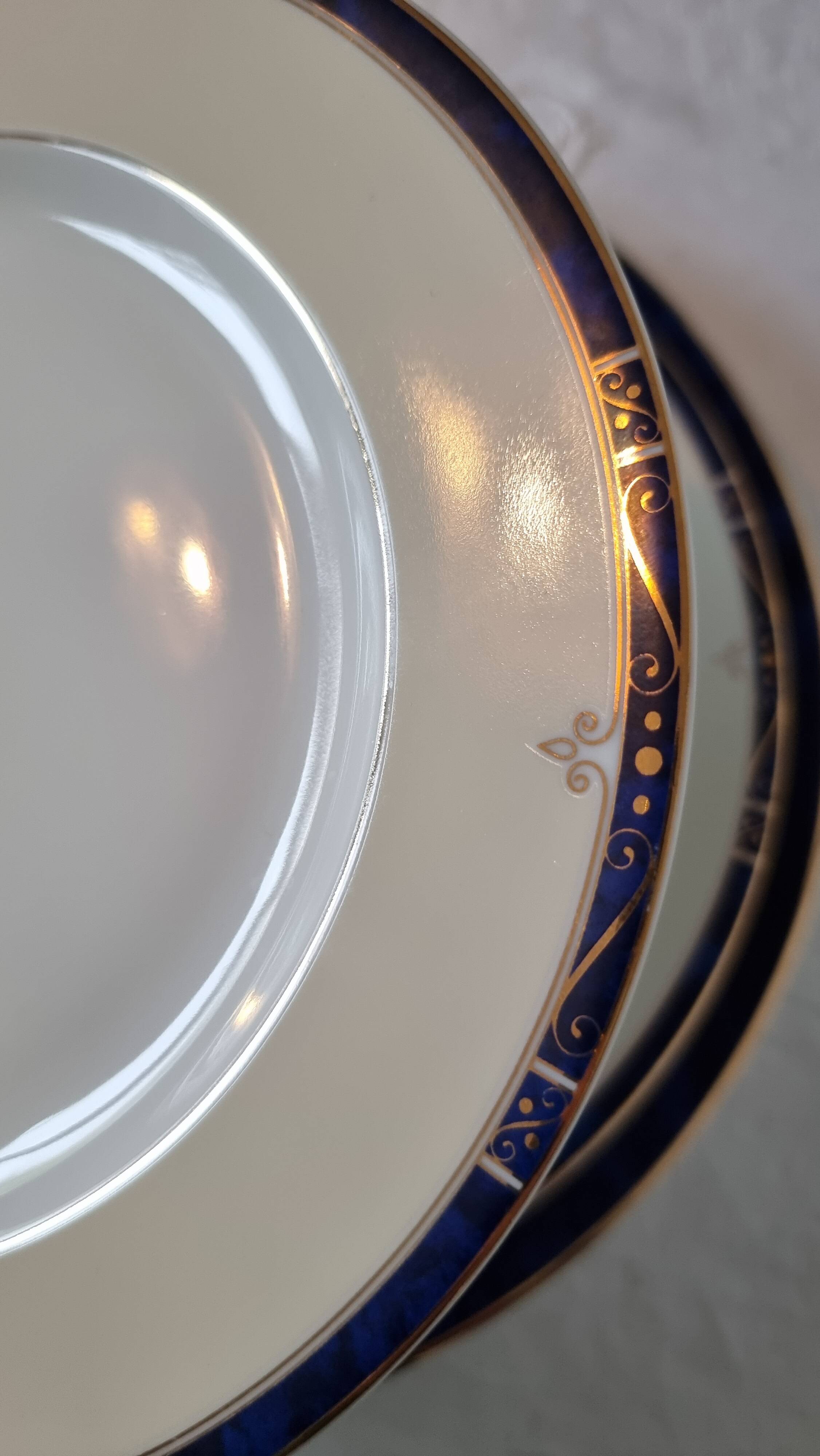18-piece porcelain dinnerware set from Limoges by Philippe Deshoulières.