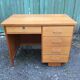 Bureau vintage en chêne à 5 tiroirs