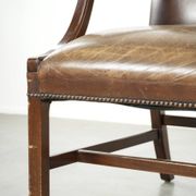 Wooden cow leather English Gainsborough chair with a stunning appearance
