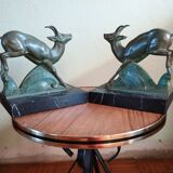 Pair - Chamois metal bookends with green patina & black marble base