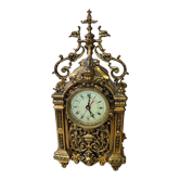 Gilt brass gothic mantle clock