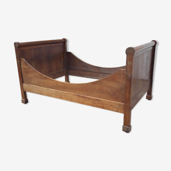 Lit bateau XIXe en bois fruitier