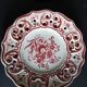 Old plates opened in handmade floral decoration