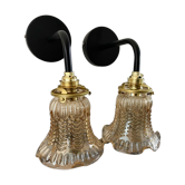 Pair of vintage wall lamps in electrified amber chiseled glass to nine
