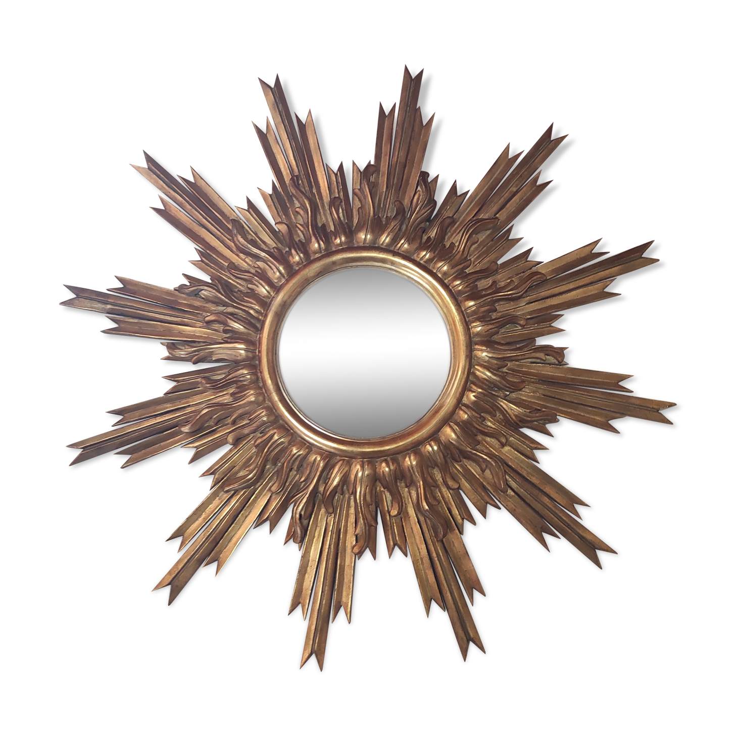 Sun mirror and witch's eye in gilded wood