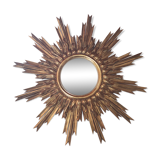 Sun mirror and witch's eye in gilded wood