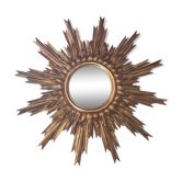 Sun mirror and witch's eye in gilded wood