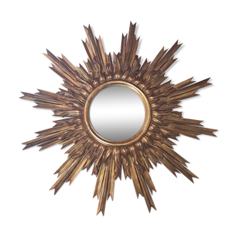 Sun mirror and witch's eye in gilded wood