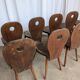 8 chaises brutalistes vintage en bois
