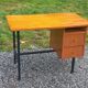 Vintage oak desk with a metallic base from the 1960s.