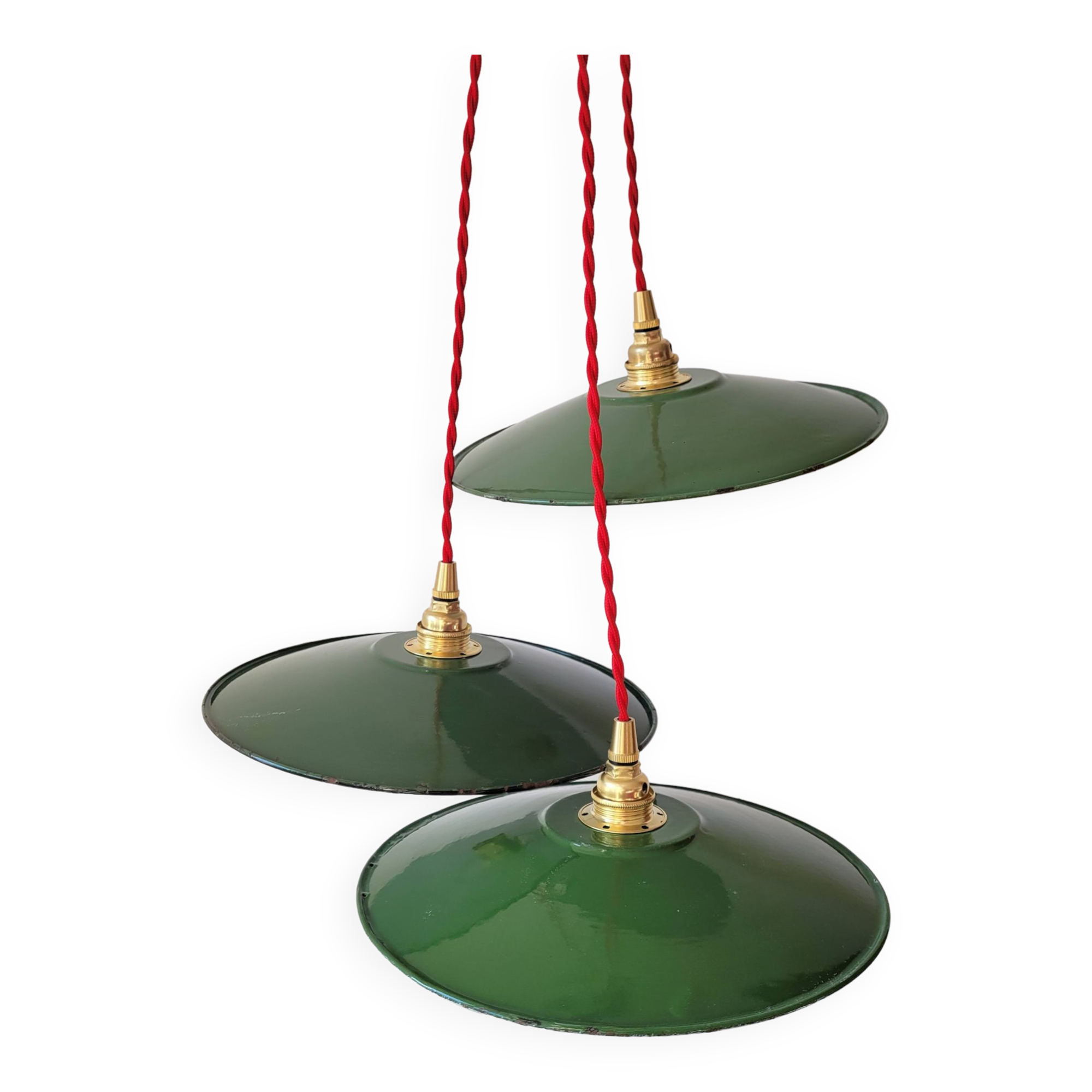 Trio of enameled sheet metal pendant lights