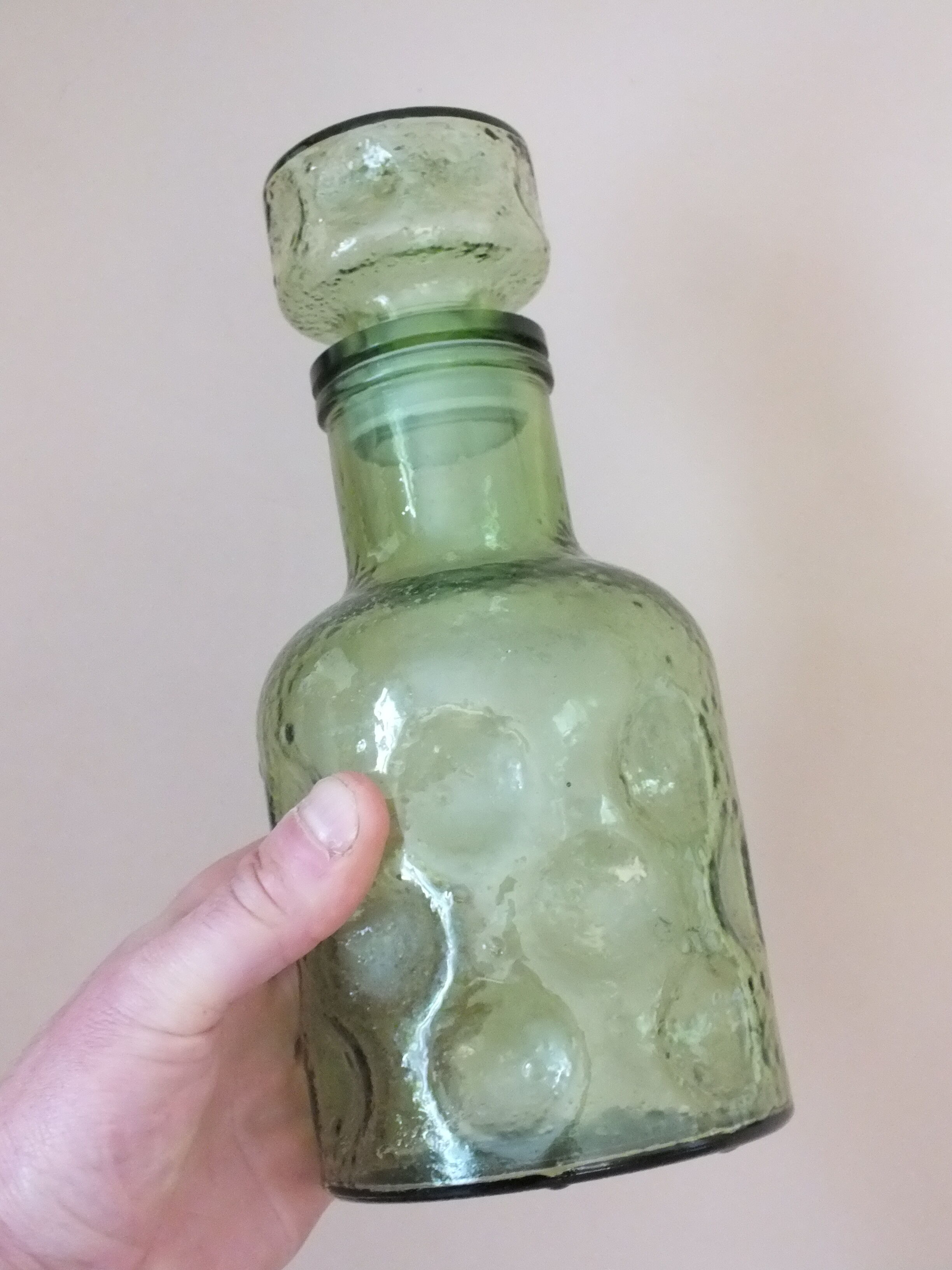 Duo of vintage bottles in Italian glass