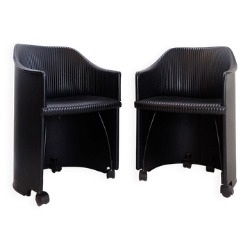 Pair of Artona armchairs in black leather by Afra and Tobia Scarpa for Maxalto.