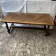 Coffee table in several types of solid wood.