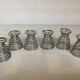 Six metal spiral egg cups