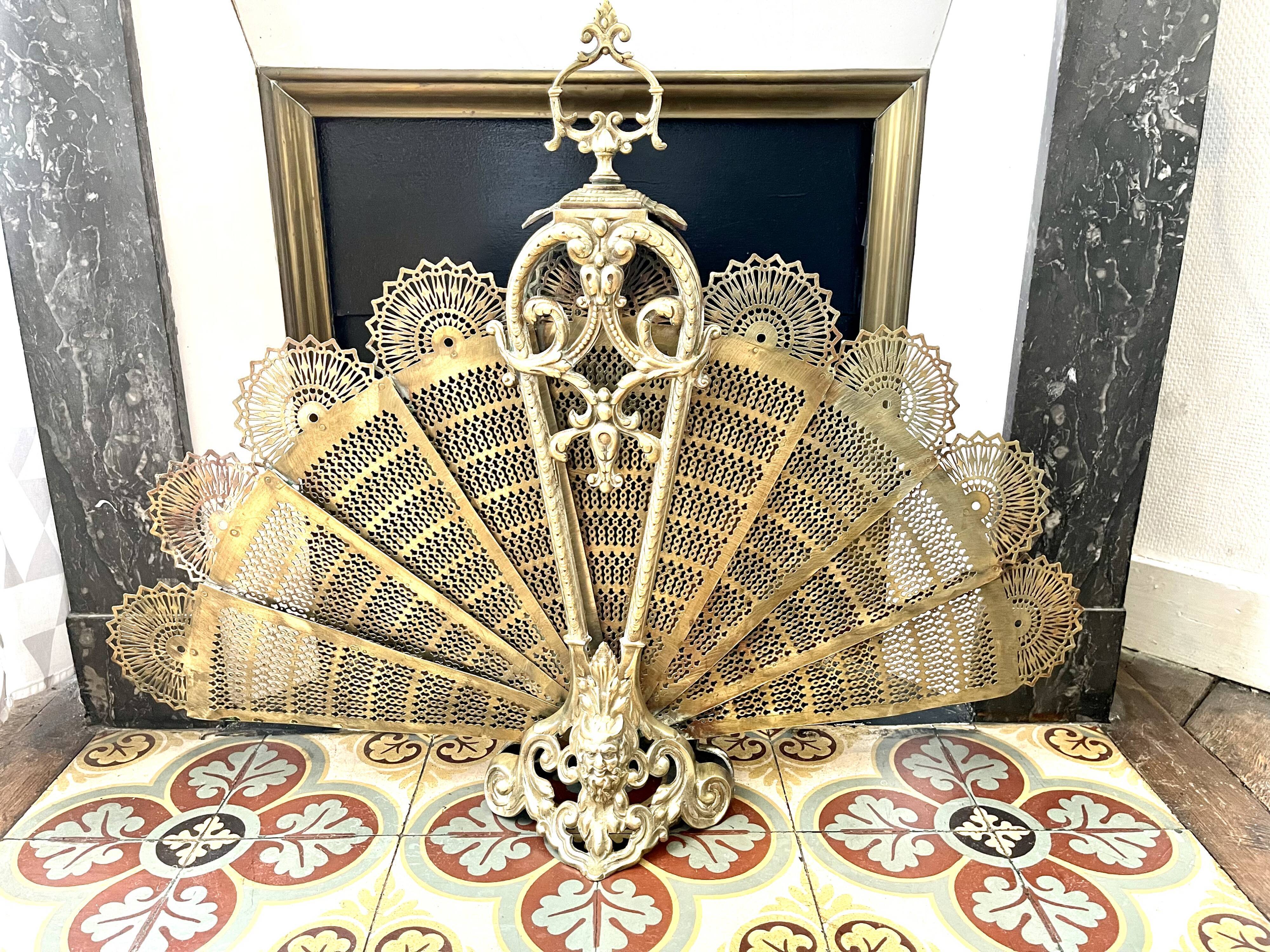 Old bronze fire firewall Napoleon 3 peacock tail fan and Vulcan head