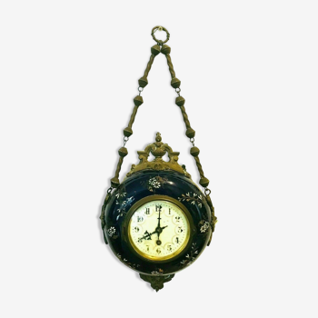 Enamelled earthenware wall clock Decoration and brass chain 20th century