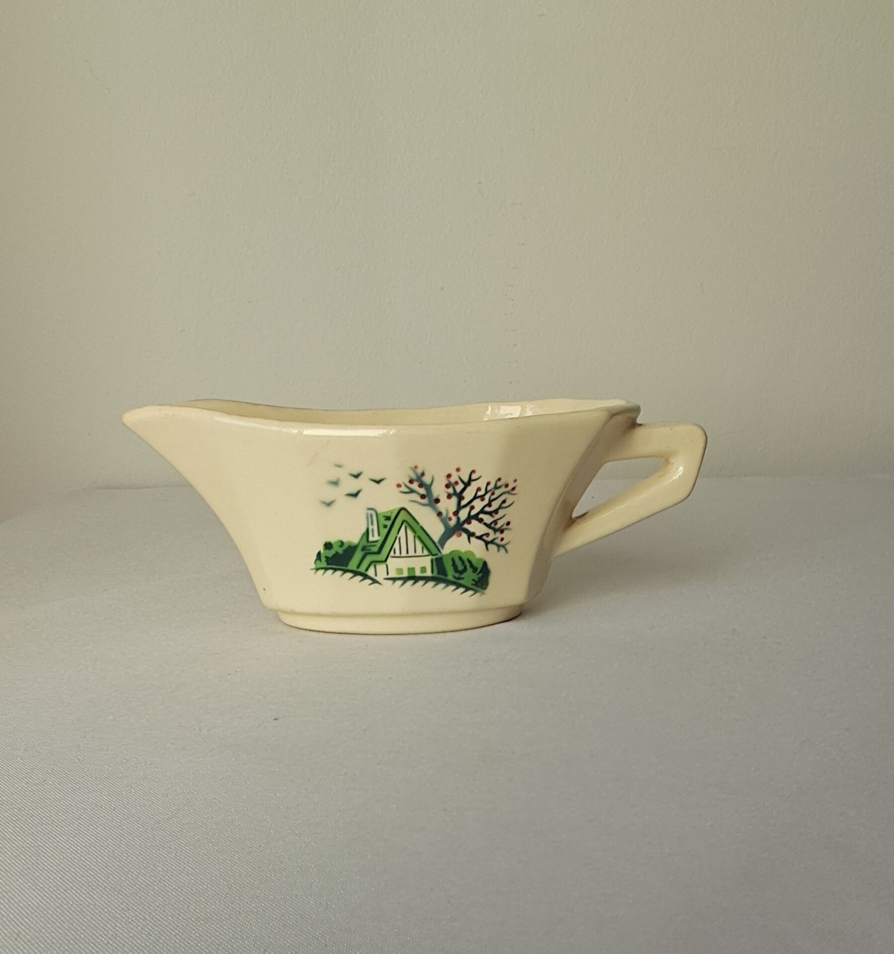 Bayeux model sauce boat from Digoin Sarreguemines. Vintage.