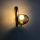 Smoked glass and gold metal wall light, design by Gaetano Sciolari.