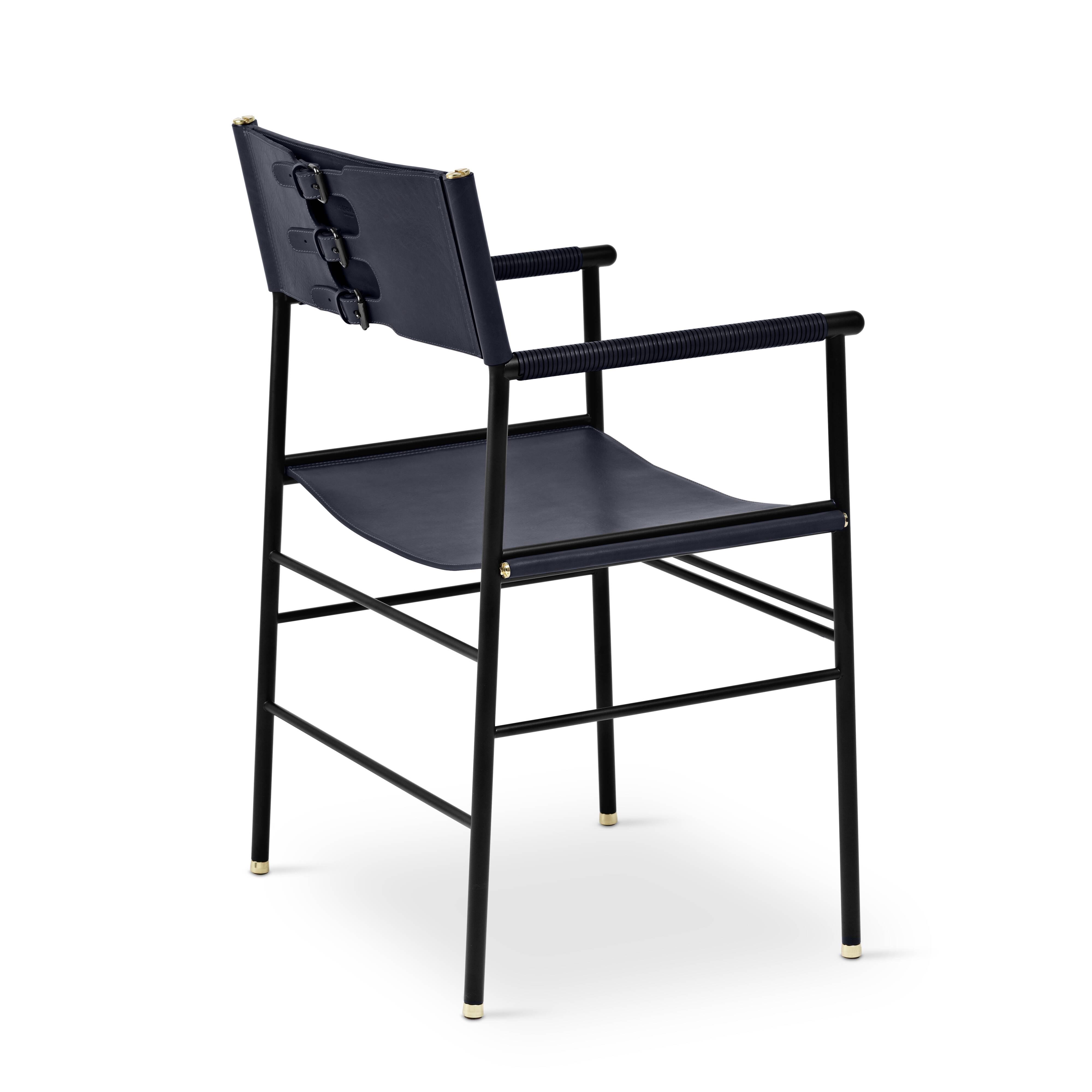 A pair of bar stools with a navy blue leather backrest and black rubber.