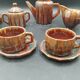 Tête-à-tête coffee service in Puisaye stoneware signed Louis Cagnat, Art Deco