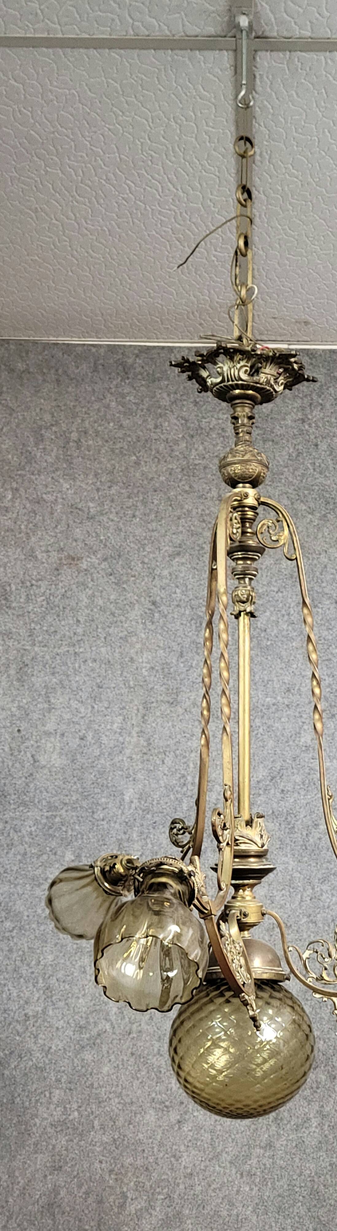 Large Napoleon III period chandelier in bronze and gilt brass