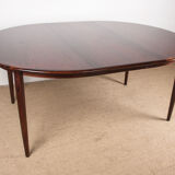Danish extendable dining table in Rio Rosewood model 55 by Arne Vodder for Sibast 1958.