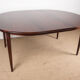 Danish extendable dining table in Rio Rosewood model 55 by Arne Vodder for Sibast 1958.