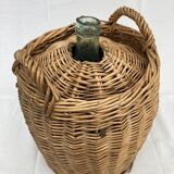 Demijohn type canister covered in wicker