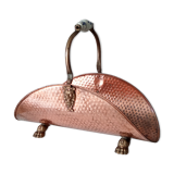 Old log holder in copper and brass