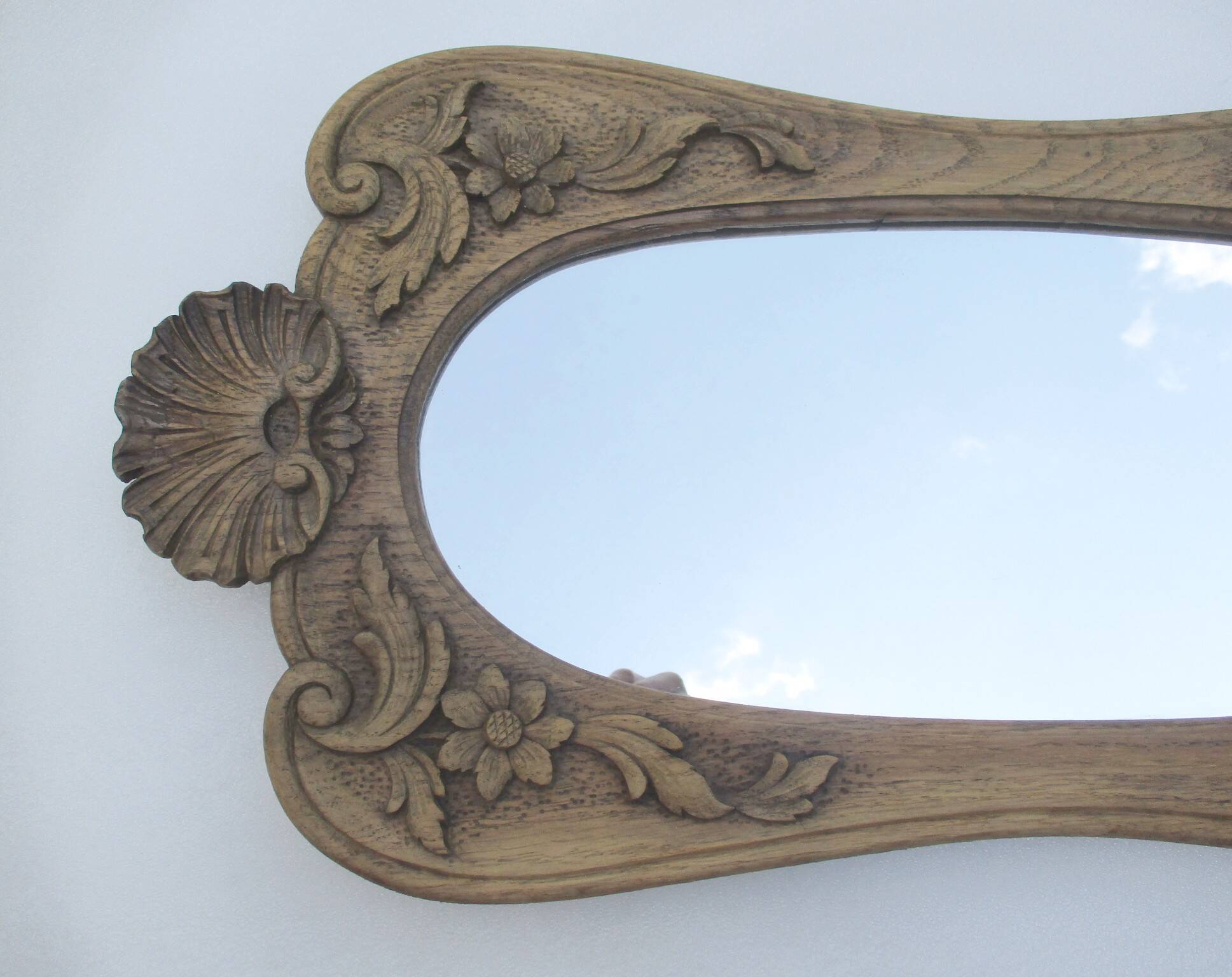 Antique carved wooden mirror