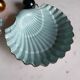 Shell-shaped porcelain dishes.