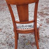 2 varnished solid wood chairs with "ethnic" padding