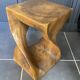 Stool no. 1 in solid raw walnut wood, carved from the mass, 1970.