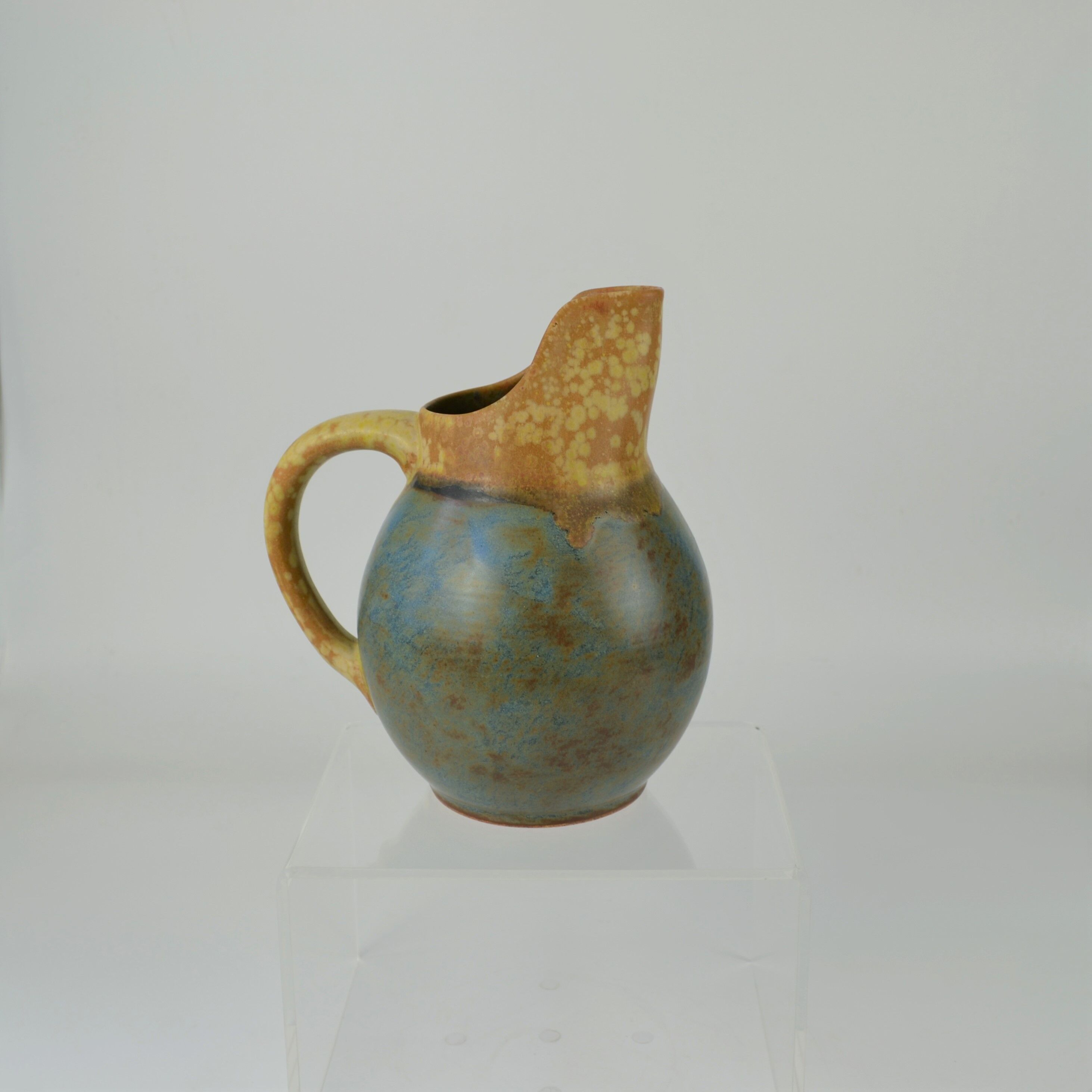 Two-tone pitcher in sandstone by Louis Lourioux
