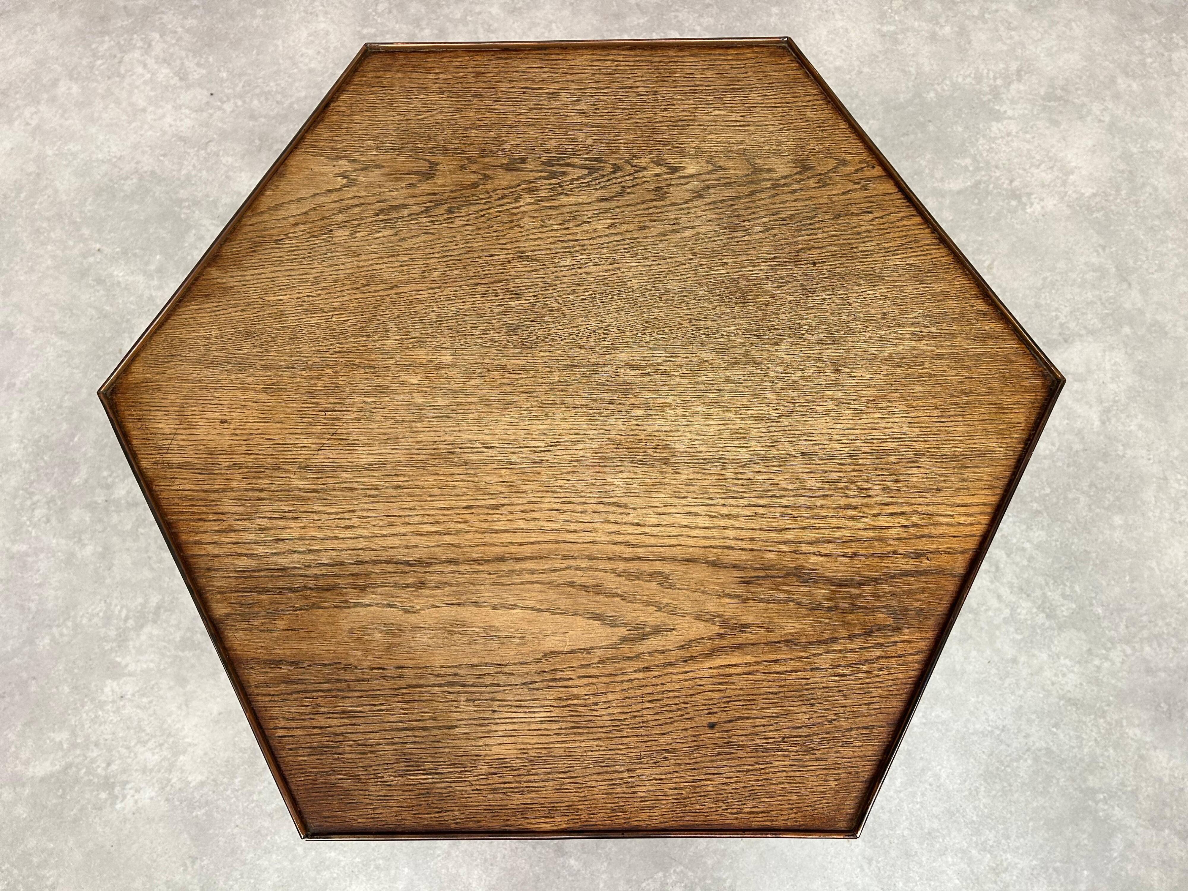 Hexagonal table with six legs in Secession style bordered with brass, attributed to Adolf Loos.