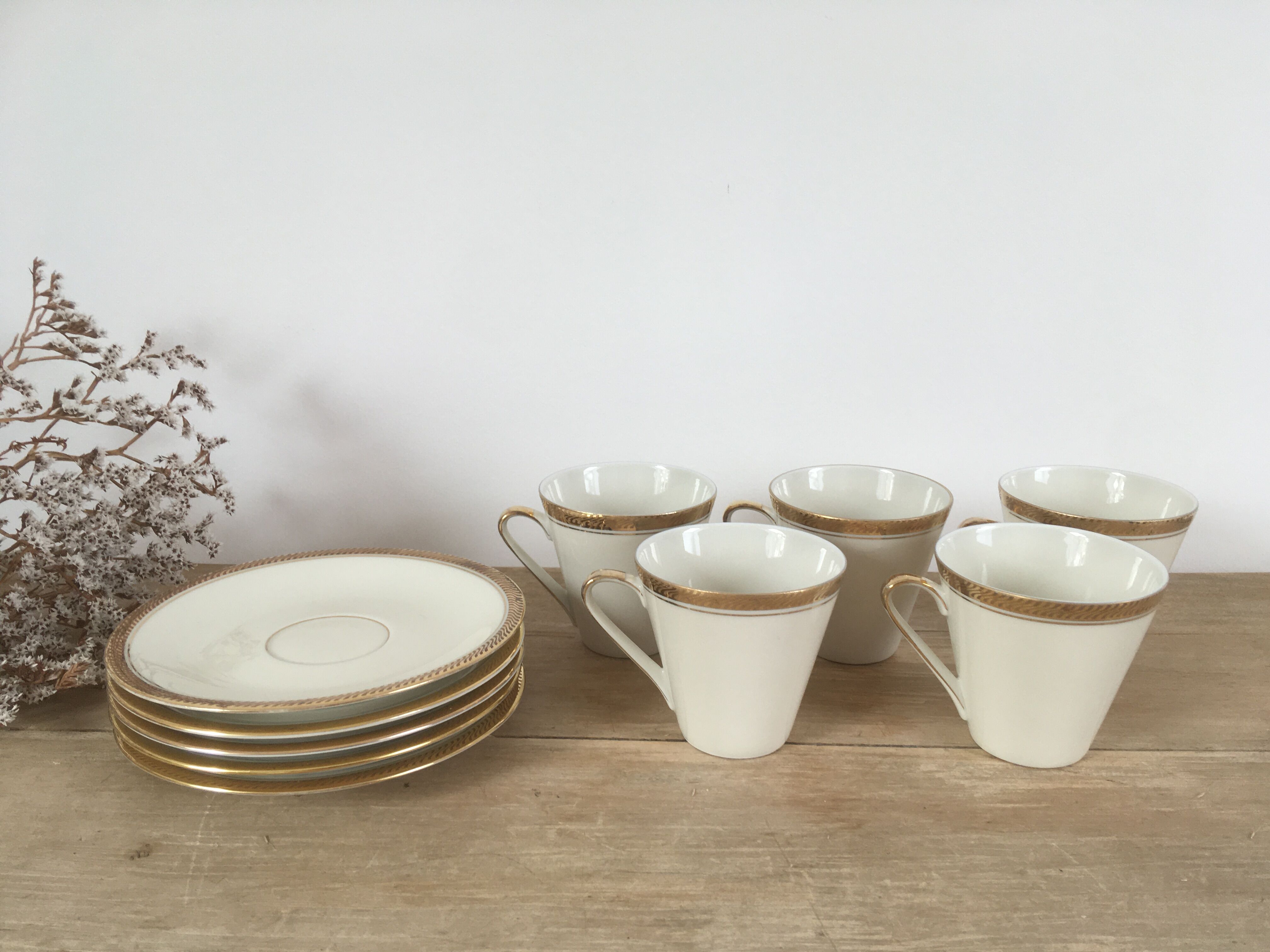 White & gold porcelain coffee cups