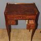 Pair of Louis XV style bedside tables in marquetry, 20th century.