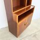 Mahogany library — closed storage and open cubbies, custom-made, 1960s.