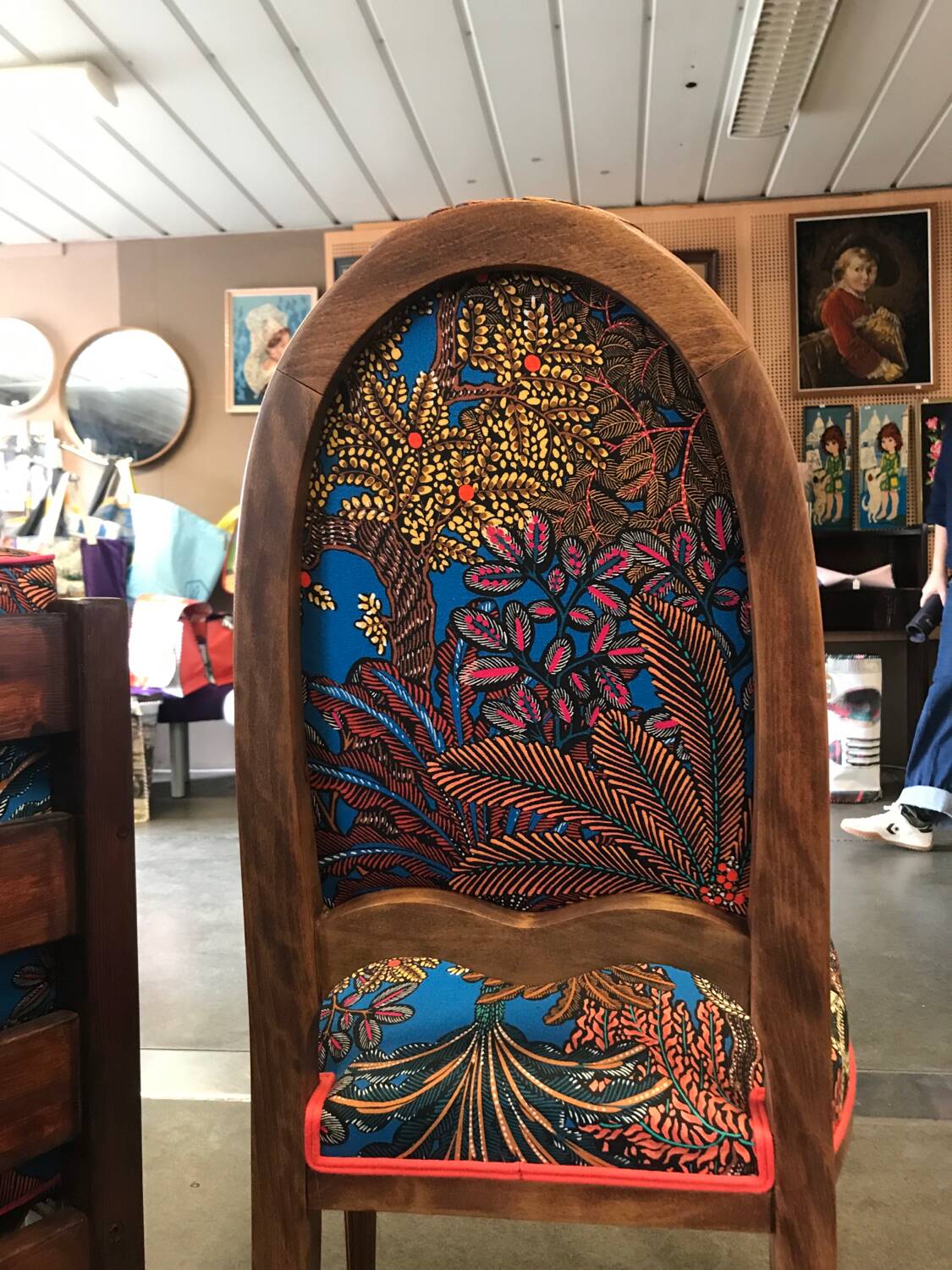 Art Nouveau chair with floral fabric and carved wood