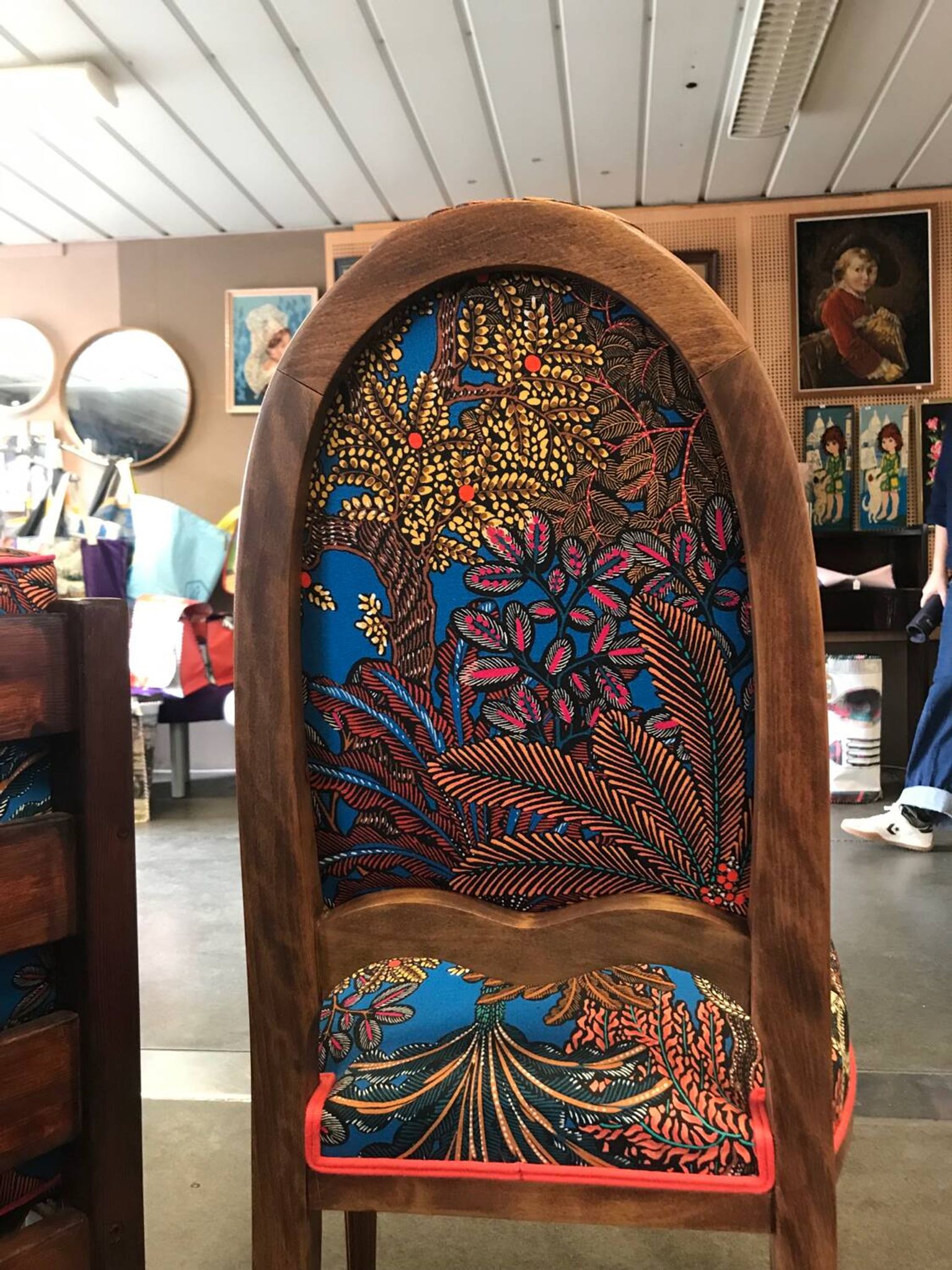 Art Nouveau chair with floral fabric and carved wood